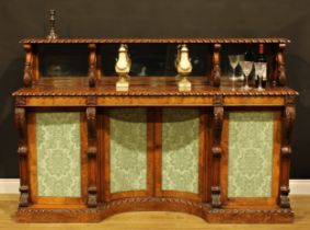 A Victorian walnut library side cabinet, the superstructure with three mirror plates above a