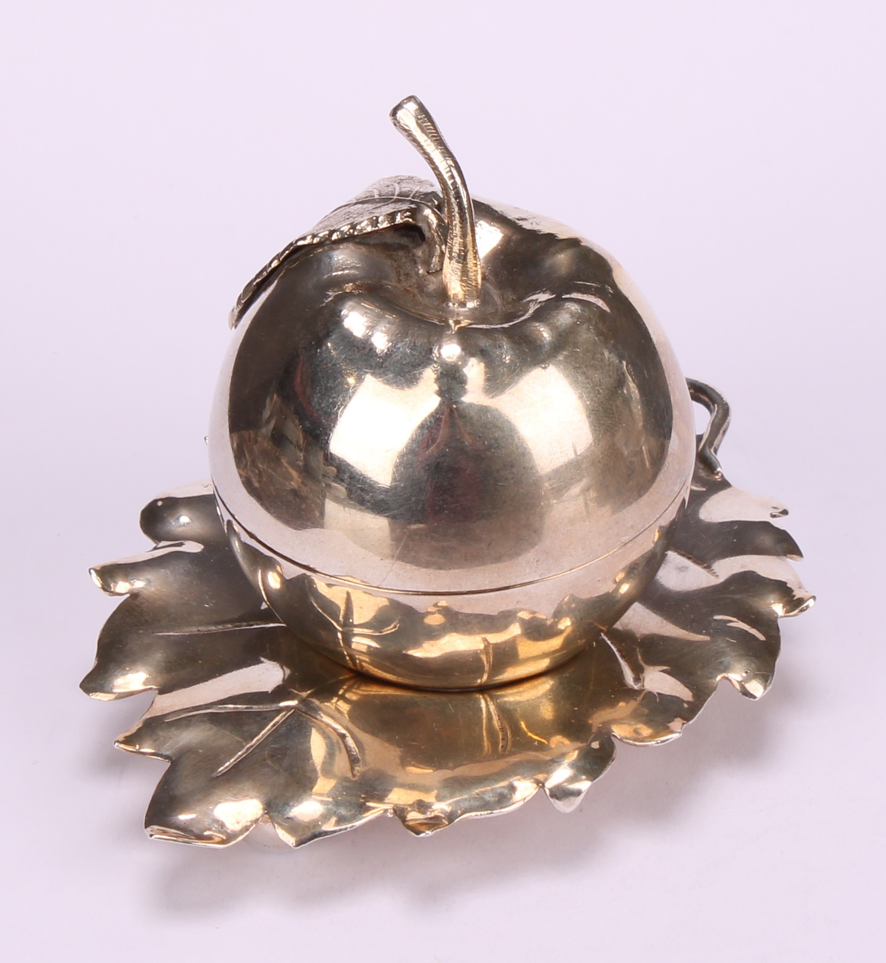 A pair of Elizabeth II silver novelty condiments and stands, modelled as apples, the cast leaf - Image 4 of 16
