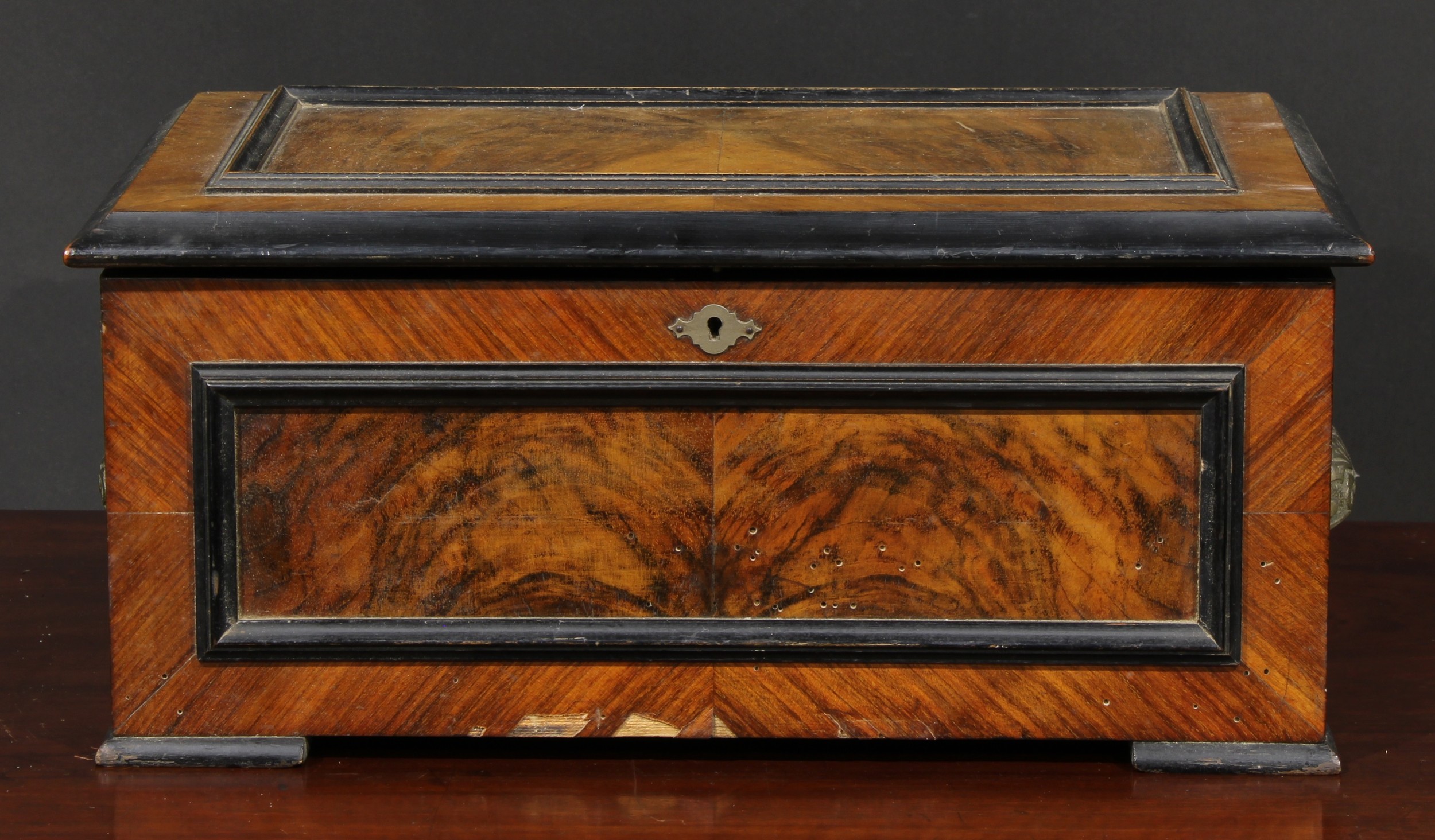 A late 19th century parcel-ebonised walnut symphonion, horizontal mechanism playing 23cm discs, - Image 2 of 4