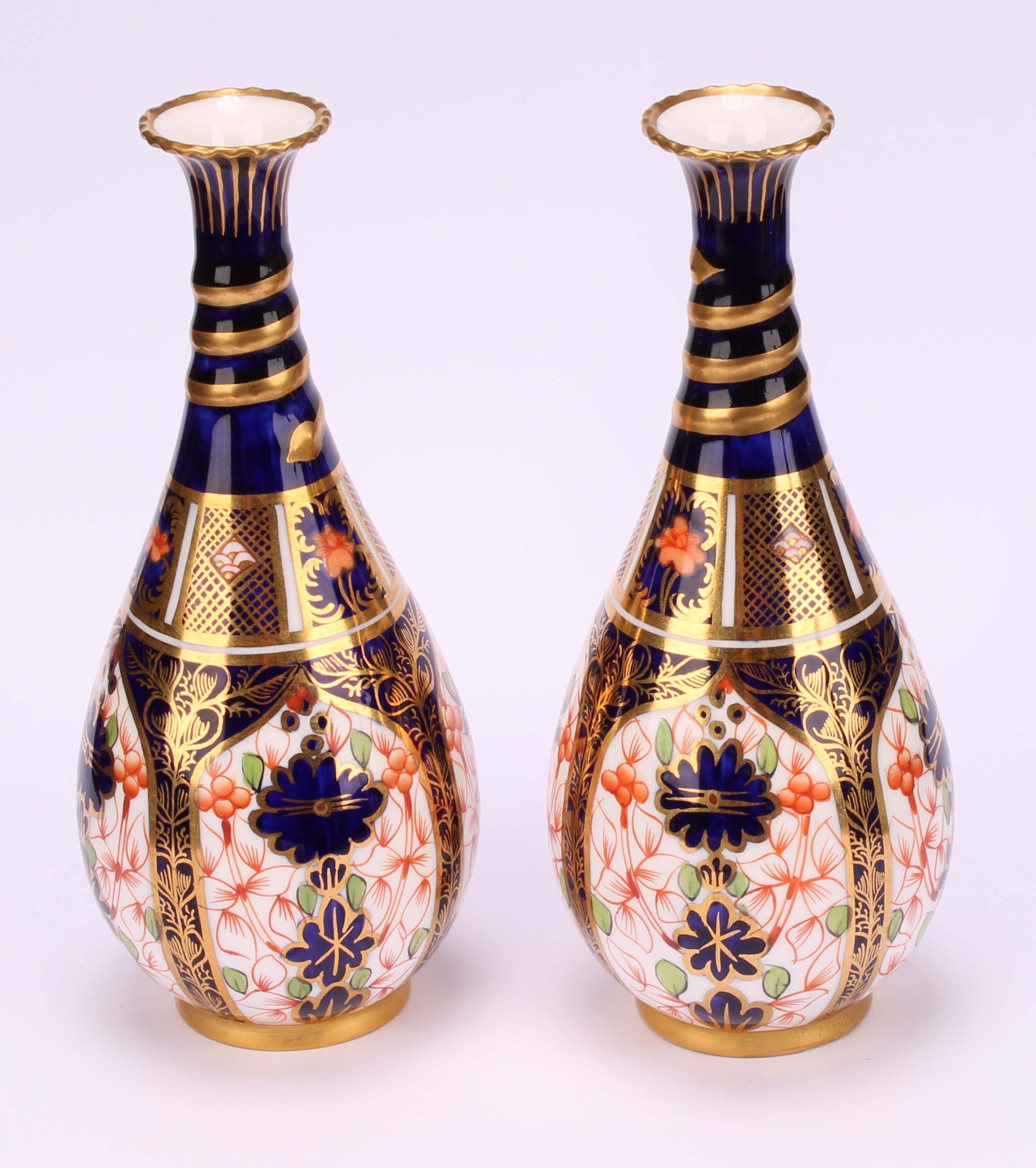 A pair of Royal Crown Derby 1128 Imari pattern ovoid bottle vases, the slender necks moulded with - Image 3 of 10