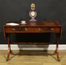 A Regency Revival mahogany sofa table, crossbanded rounded rectangular top with fall leaves above