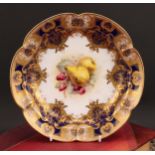A Royal Worcester shaped circular dish, painted by Ricketts, signed, with ripening fruit within