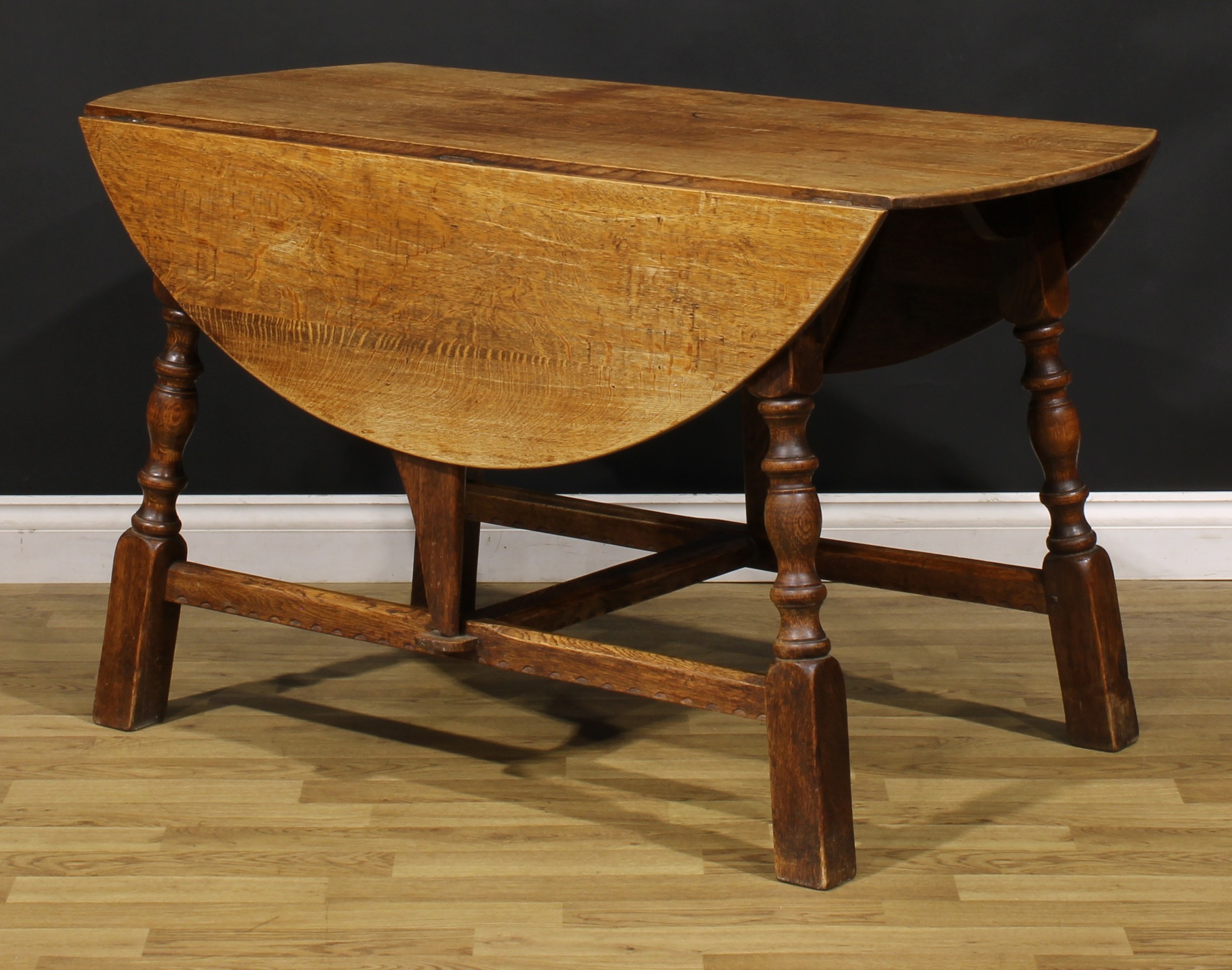 An oak dropleaf dining table, by Rupert/Nigel Griffiths Monastic Woodcraft, 74cm high, 60.5cm - Image 4 of 4