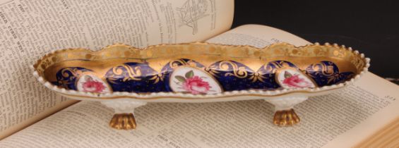 An English porcelain shaped oval pen tray, the field with three oval reserves painted with pink