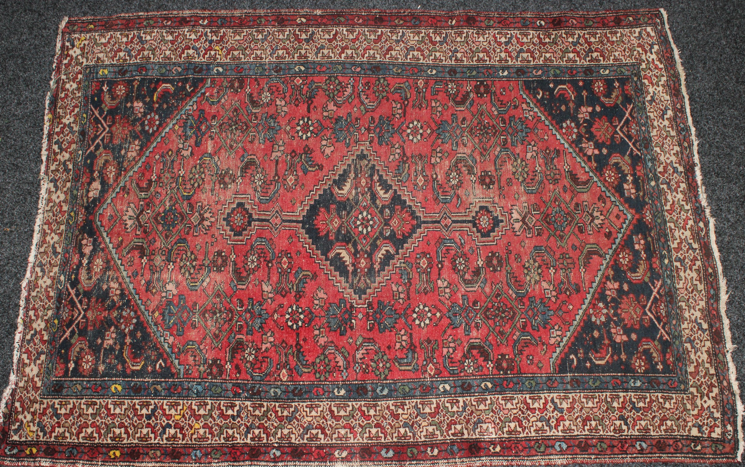 An Iranian Hamadan type wool rug or carpet, 198cm x 143cm