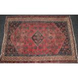An Iranian Hamadan type wool rug or carpet, 198cm x 143cm