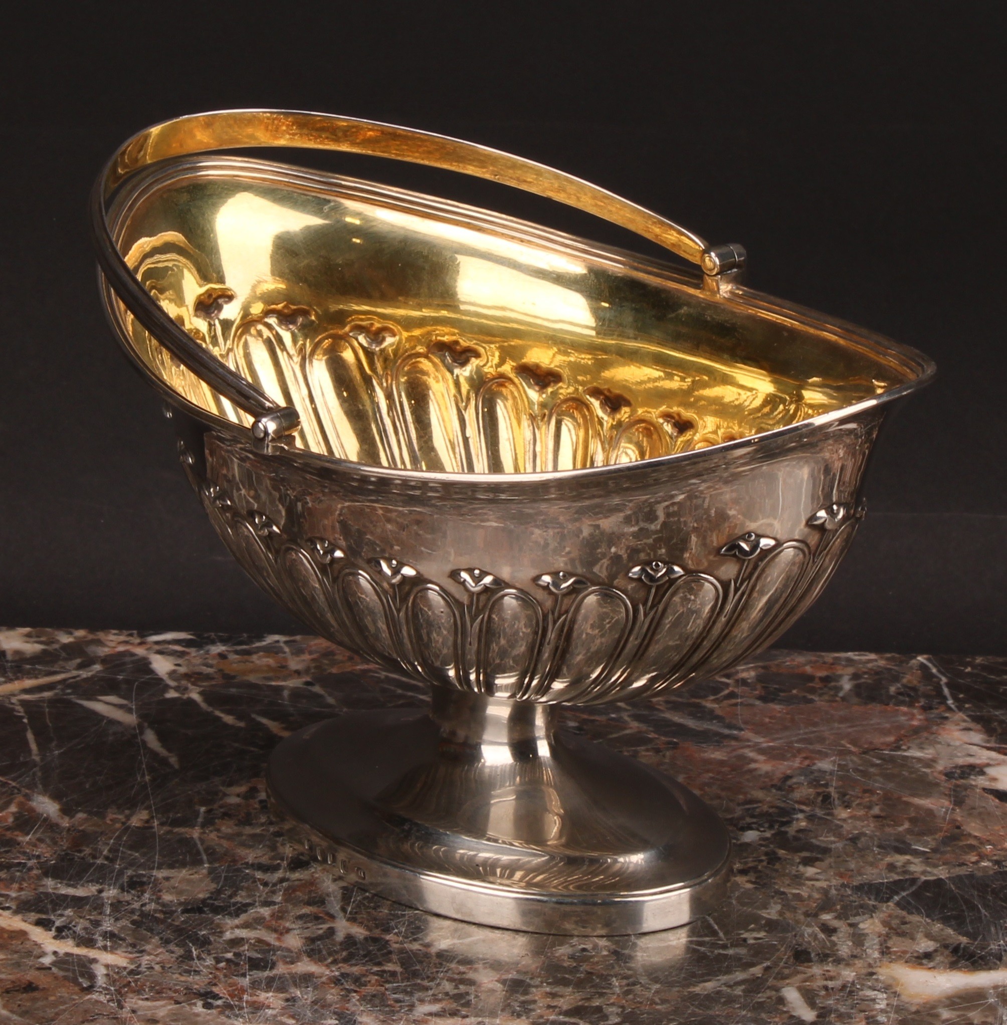 An unusually large George III silver half-fluted boat shaped pedestal sugar basket, swing handle, - Image 4 of 5