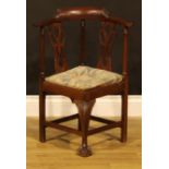A Chippendale Revival mahogany child’s corner chair, shaped and pierced splats, drop-in seat,