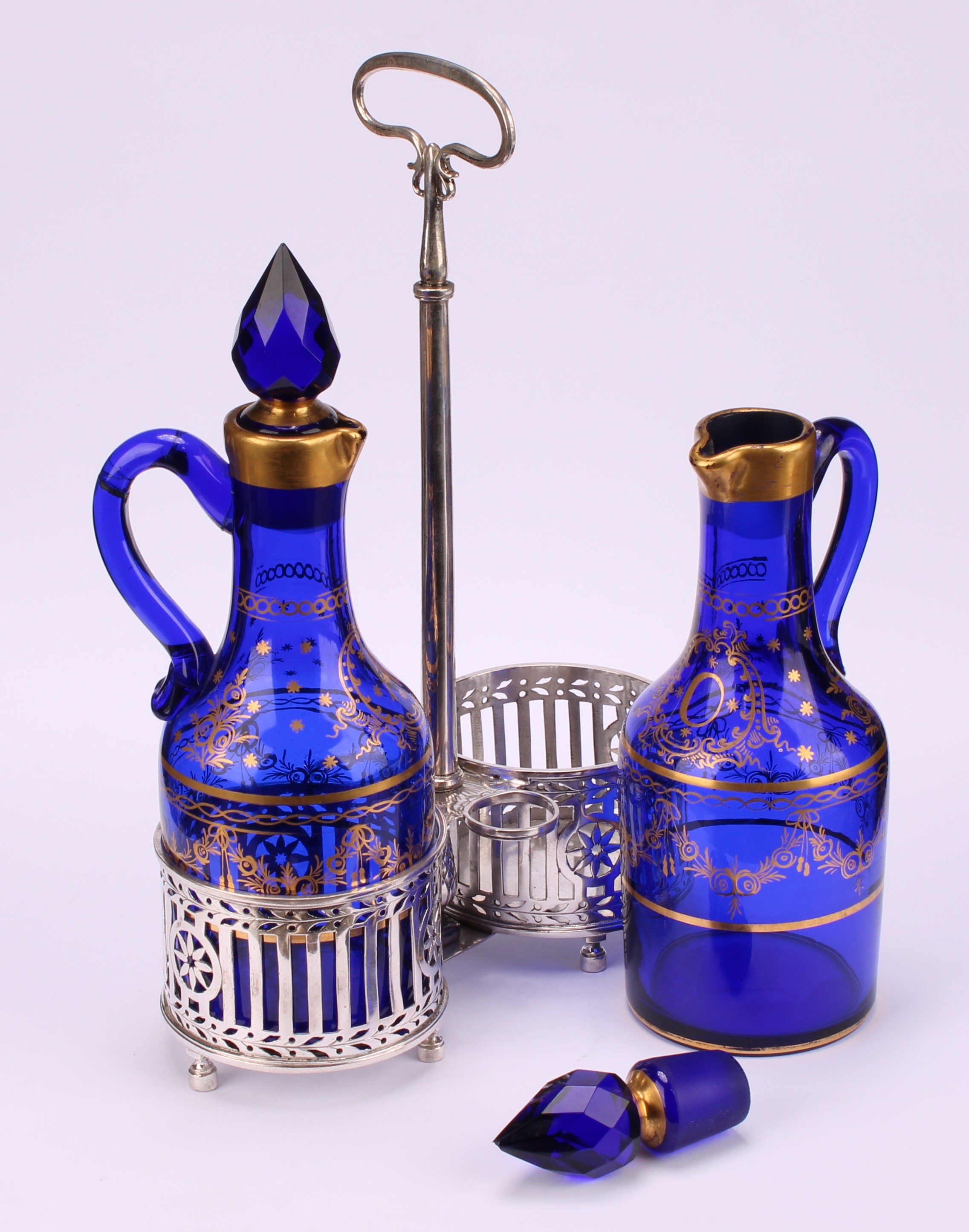 A 19th century Belgian silver two-bottle oil and vinegar cruet, gilded blue glass decanters and - Image 4 of 4
