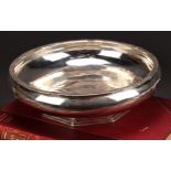 Cecil Walker of Hampstead (d.1983) - an Arts and Crafts silver fruit bowl, lightly planished, the