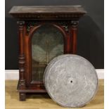 A 19th century coin operated penny-in-the-slot polyphon, the vertical movement playing 50cm discs,