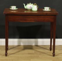 A George III mahogany tea table, rectangular folding top above a deep frieze, tapered square legs,