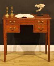 A George III oak lowboy, rectangular top above three cockbeaded drawers, tapered square legs, 74.5cm