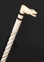 A 19th century sailor's maritime whale bone walking stick, the L-shaped handle as the head of a
