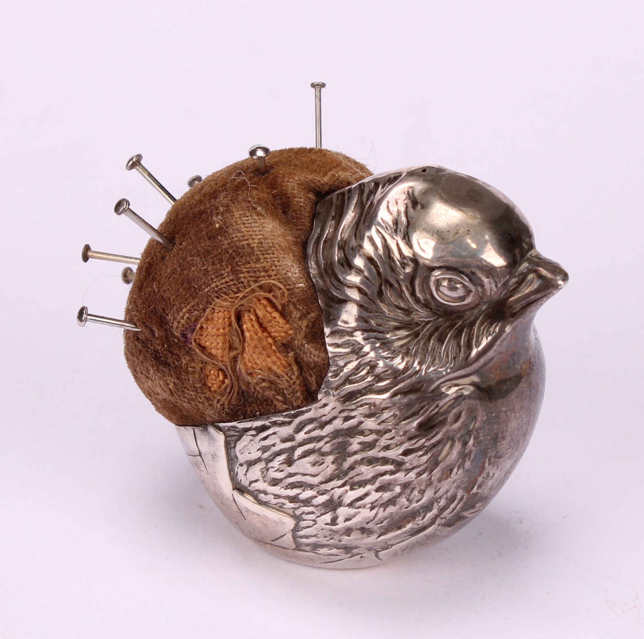 An Edwardian silver novelty pin cushion, as a chick, 4cm long, Sampson Mordan & Co, Chester - Image 3 of 4