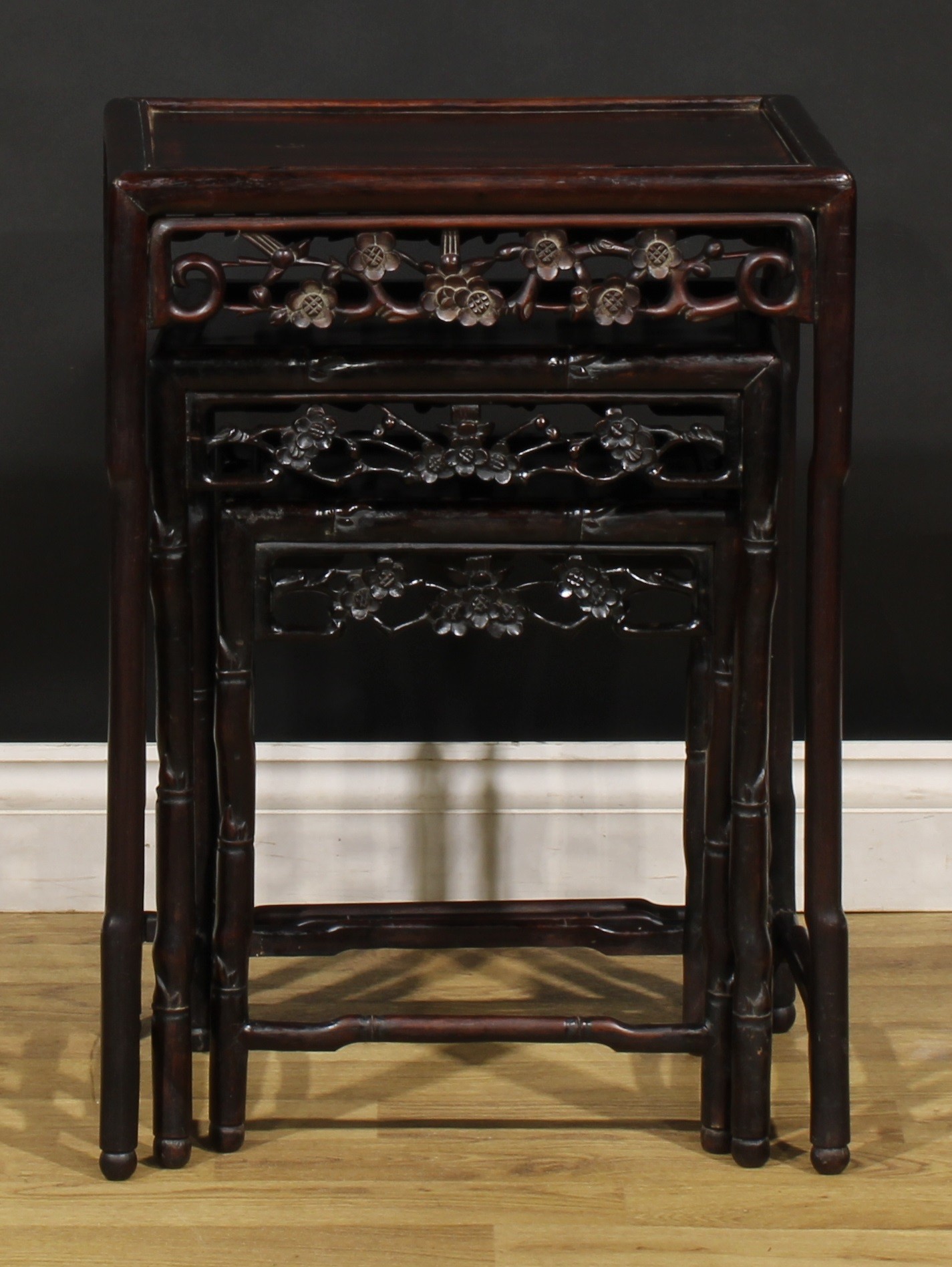 A Chinese hardwood harlequin nest of three occasional tables, each with a rectangular panel top, - Image 3 of 5