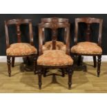 A set of four late Victorian walnut gondola form dining chairs, each curved cresting rail carved