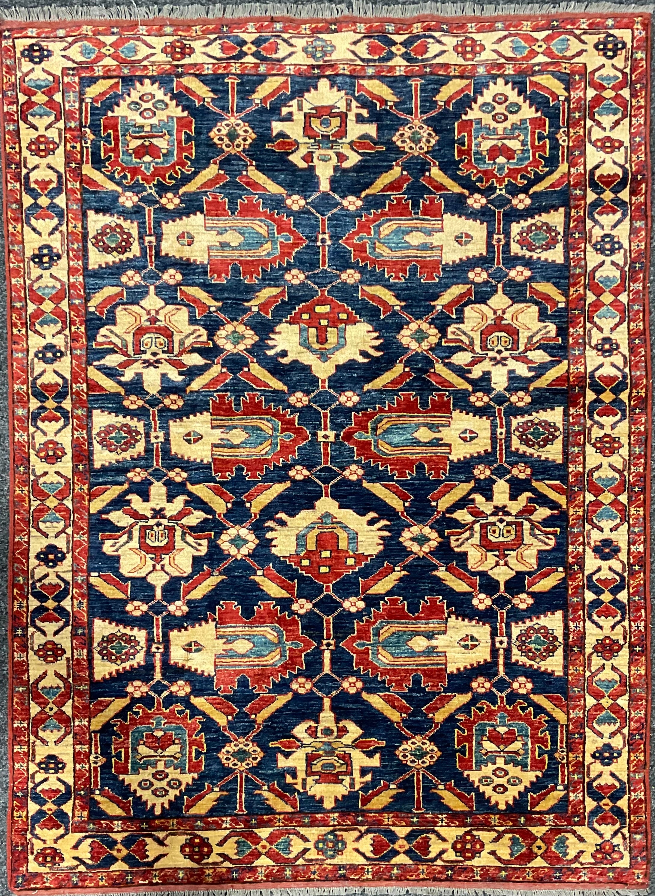 An Afghan design Shirvan type wool rug or carpet, worked in the traditional manner, 191cm x 139cm