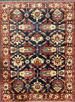 An Afghan design Shirvan type wool rug or carpet, worked in the traditional manner, 191cm x 139cm