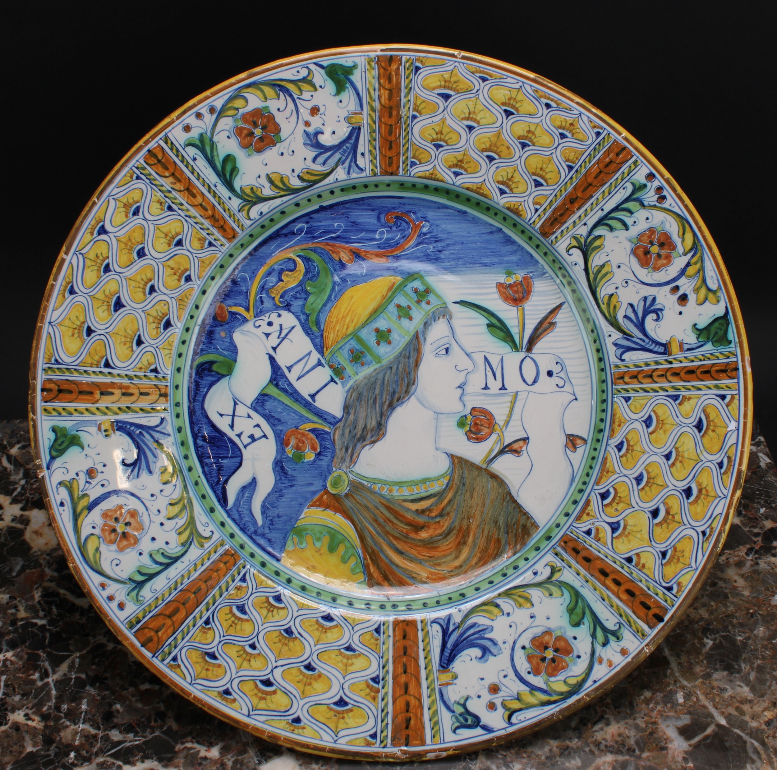 An Italian maiolica circular charger, painted in the Renaissance taste with a bust-length portrait