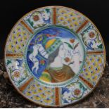 An Italian maiolica circular charger, painted in the Renaissance taste with a bust-length portrait