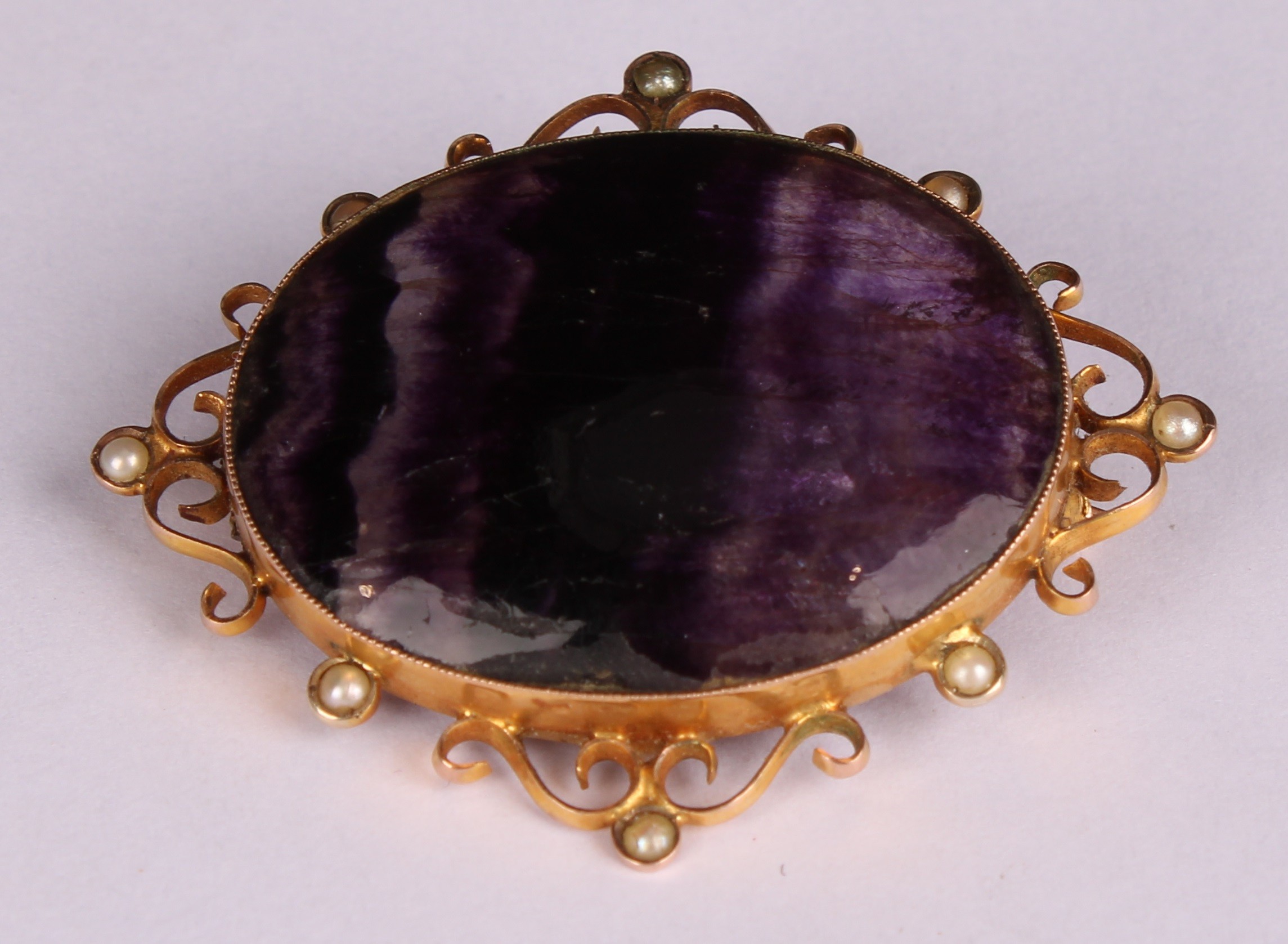 A late 19th century 9ct gold mounted Derbyshire Blue John polished oval brooch, the openwork - Image 2 of 4