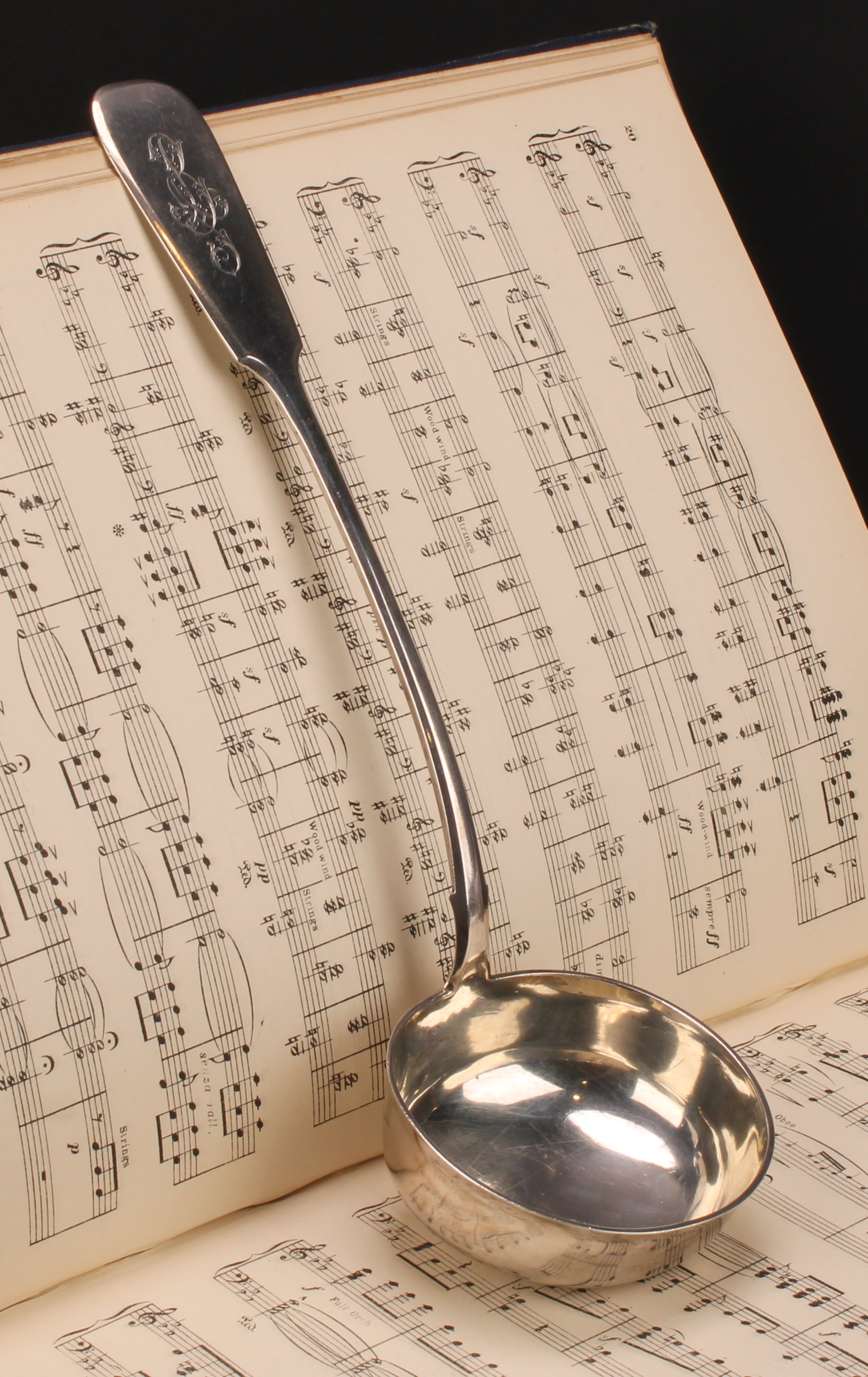 A Russian silver Fiddle pattern soup ladle,31cm long, kokoshnik mark, c.1896 - 1908, 208g