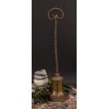 A 19th century brass and cast iron bell shaped door stop or porter, the handle cast as a serpent,