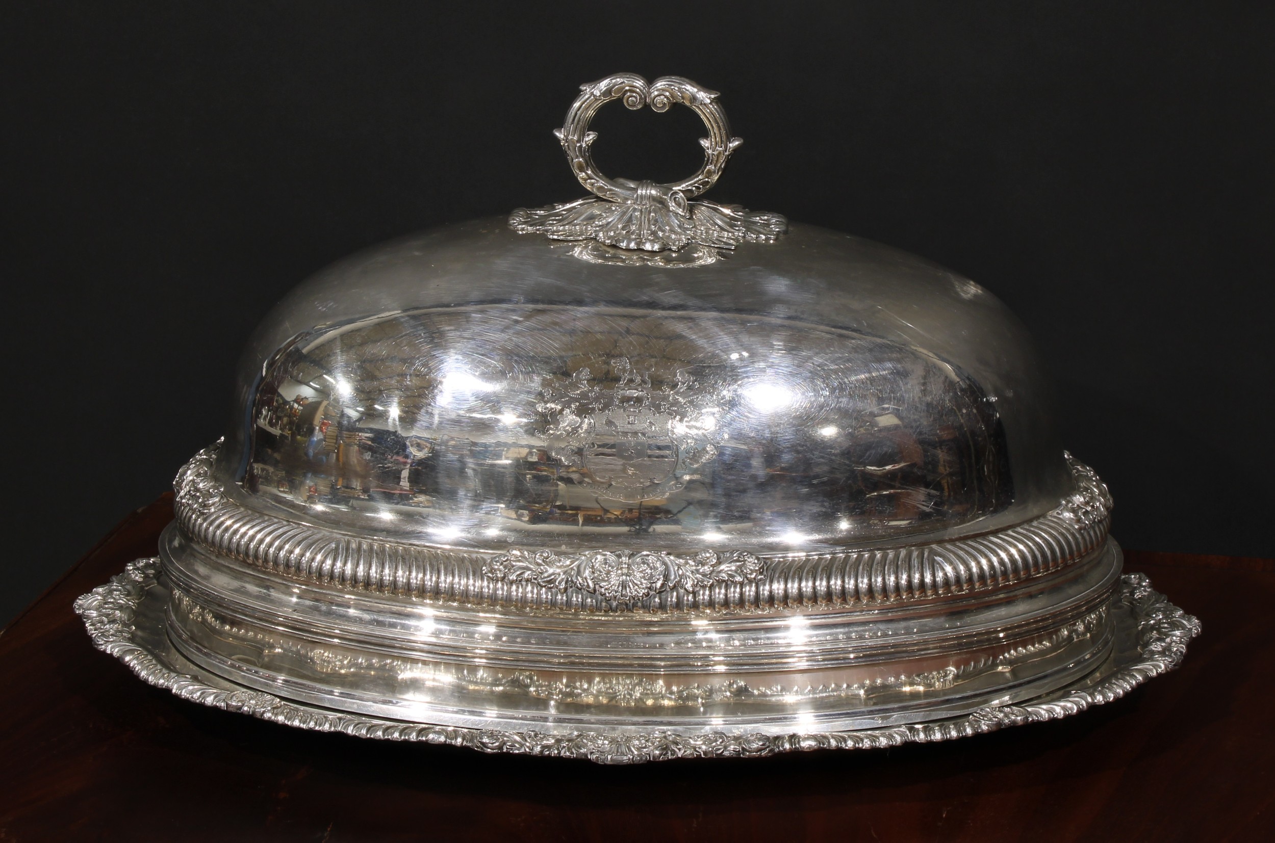 A large George III Old Sheffield Plate meat dish and dome cover, bold acanthus loop handle,