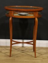 A Sheraton Revival tulipwood crossbanded satinwood oval bijouterie table, hinged top, French