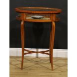 A Sheraton Revival tulipwood crossbanded satinwood oval bijouterie table, hinged top, French