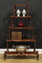 A Victorian mahogany five-tier serpentine whatnot, spirally turned foresupports, turned feet,