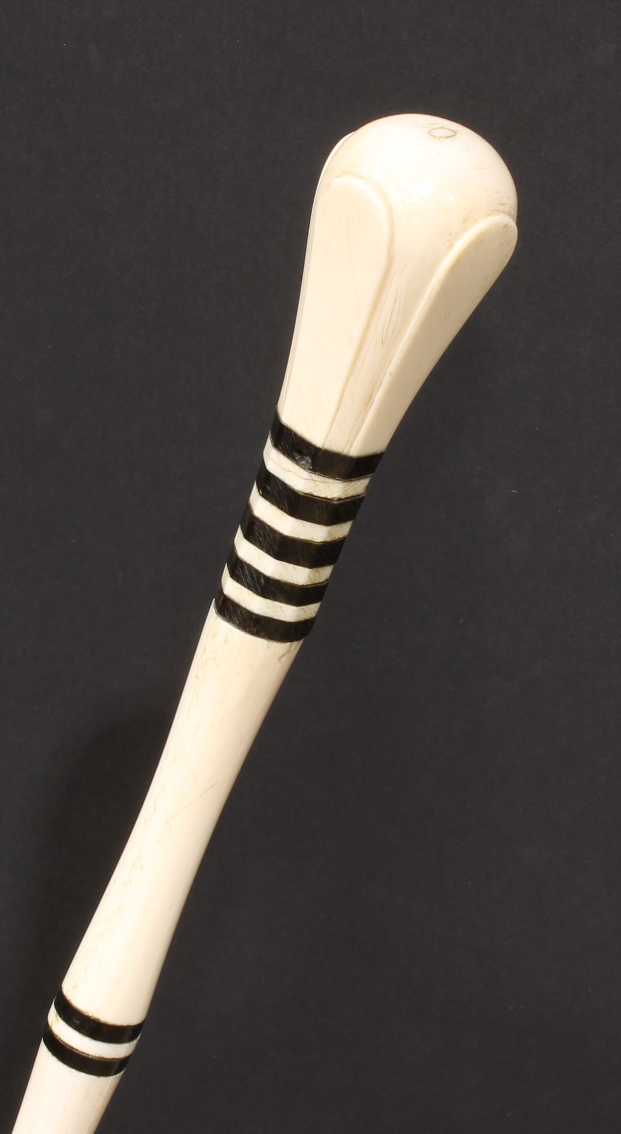 A 19th century sailor's maritime marine ivory walking cane, the shaft with baleen spacers, 89cm long