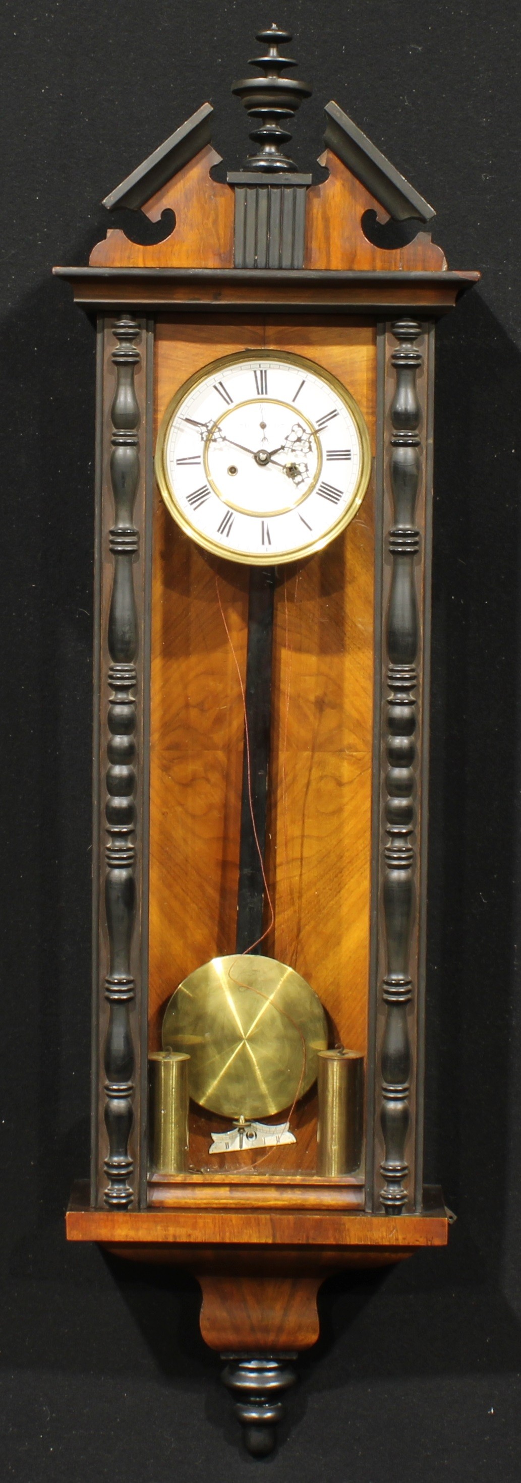 A 19th century walnut and ebonised Vienna regulator wall clock, 16cm enamel dial inscribed with