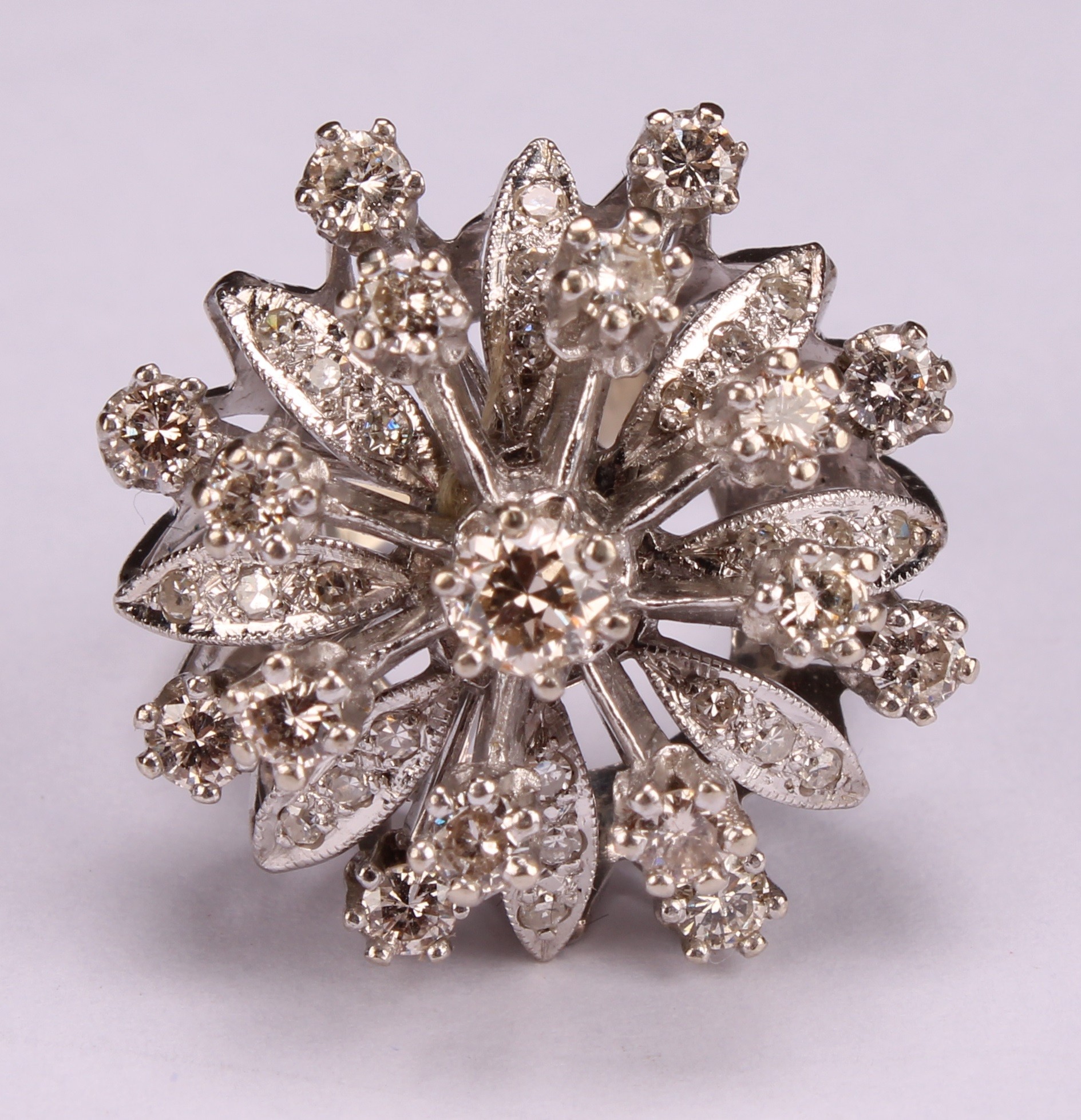 A large and impressive flowerhead diamond cluster ring, the central round brilliant cut stone within - Image 4 of 4