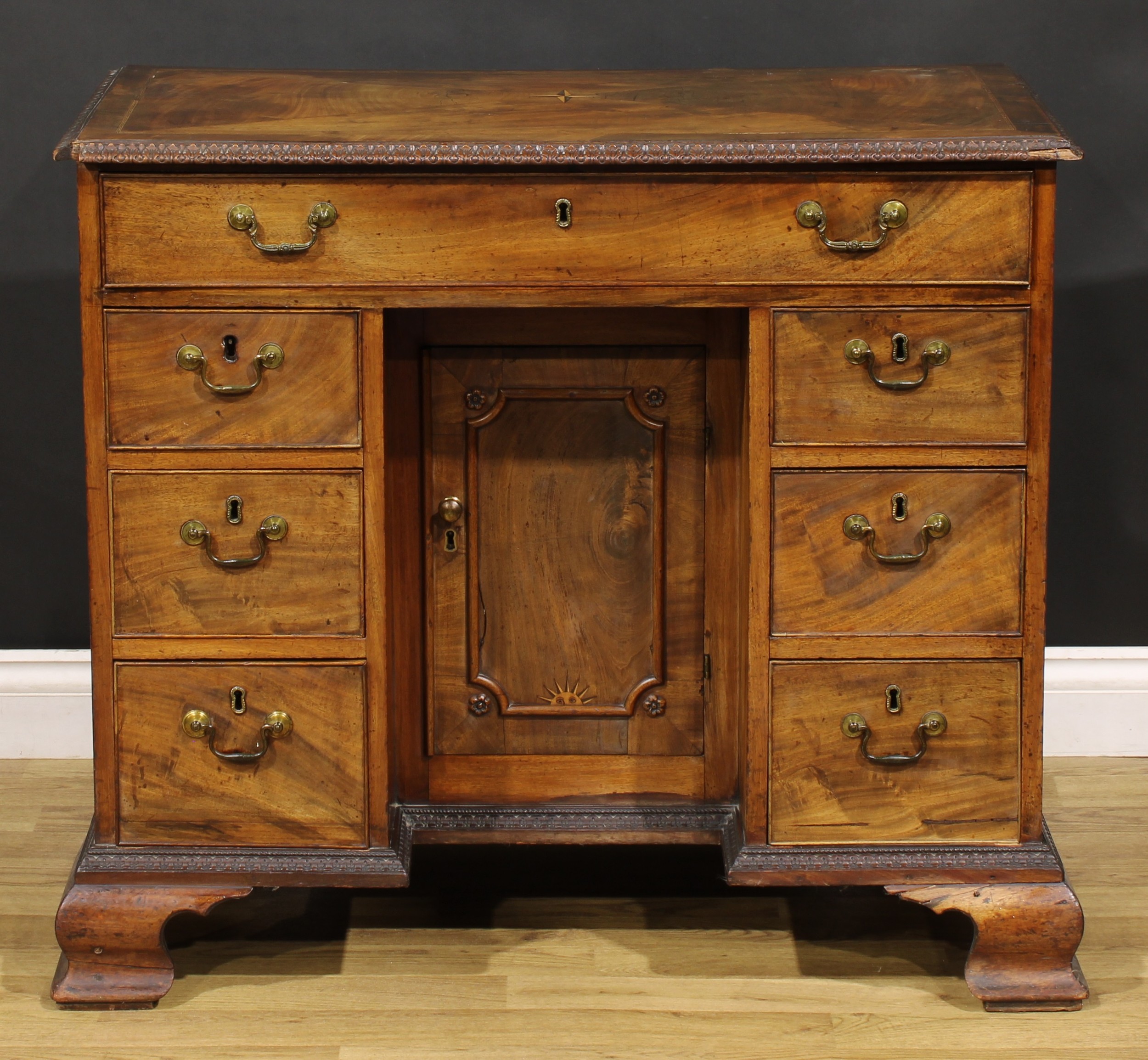 A George III mahogany kneehole desk, rectangular top with moulded foliate carved edge centred by a - Image 2 of 6