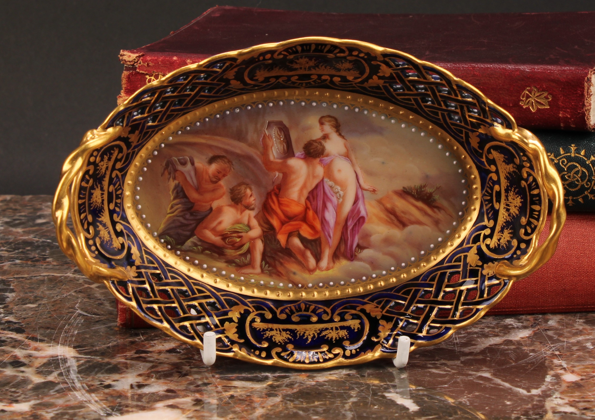 A Vienna porcelain two-handled basket, the field painted with classical scene, Venus und Vulkan,