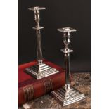 A pair of George III 'Teutonic' German silver plated or paktong table candlesticks, detachable