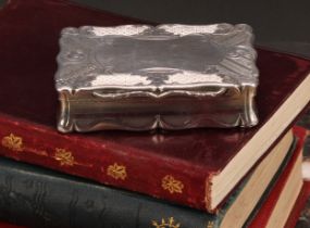 An early Victorian silver shaped rectangular snuff box, engraved with flowers and leafy scrolls,