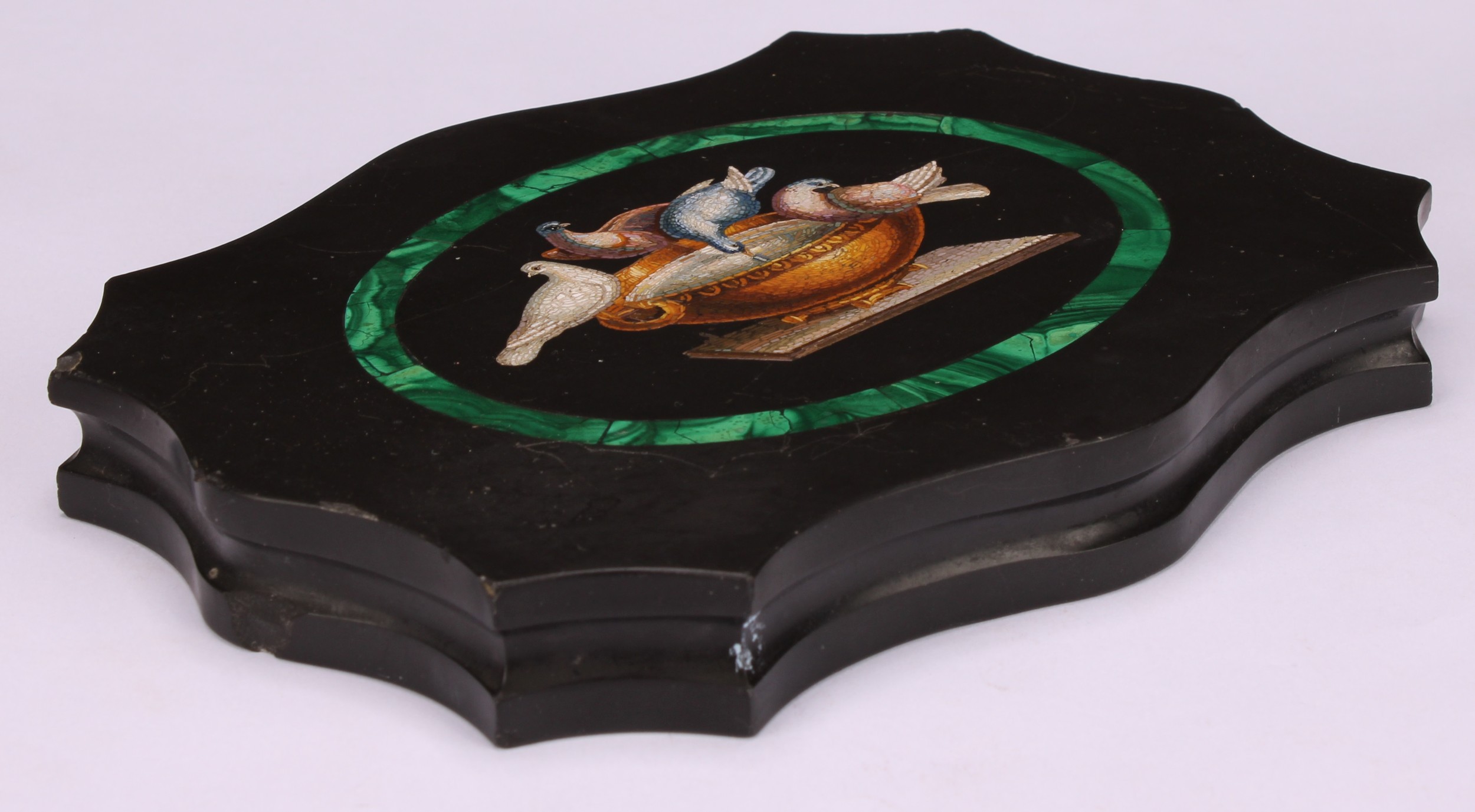 An Italian Grand Tour micro-mosaic cartouche shaped black marble desk weight, decorated in - Image 4 of 5