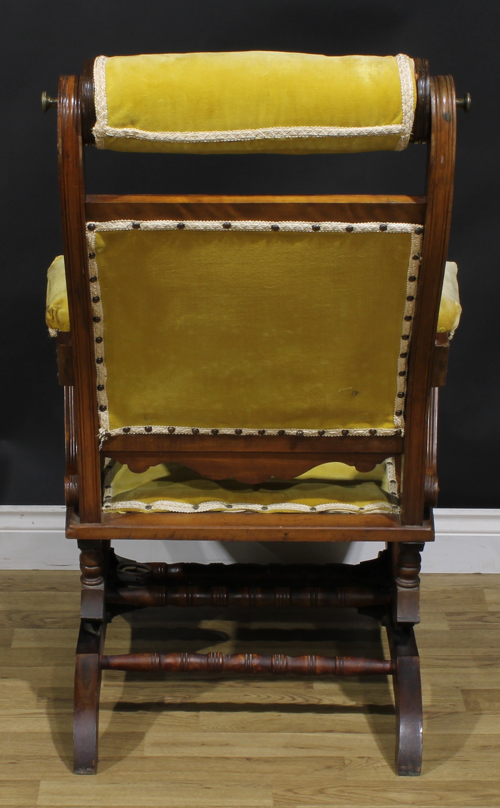 An unusual 19th century American walnut rocking chair, adjustable headrest, shaped arms, reeded - Image 4 of 4