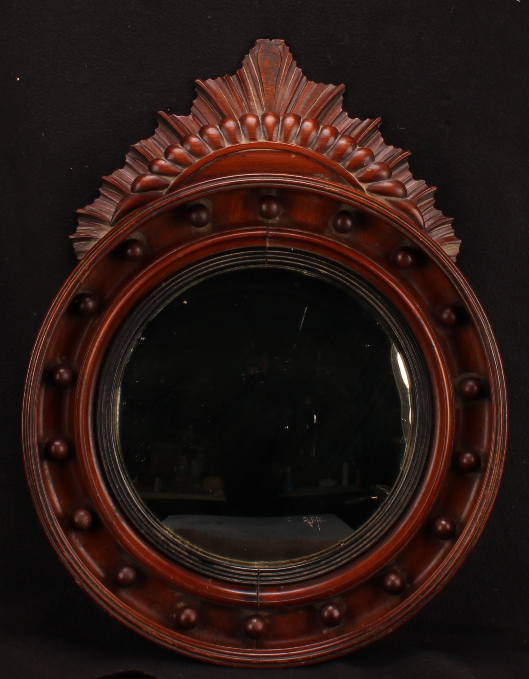 A 19th century bullseye looking glass, convex mirror plate, 60cm high overall