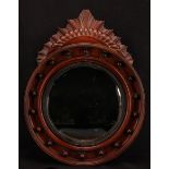 A 19th century bullseye looking glass, convex mirror plate, 60cm high overall