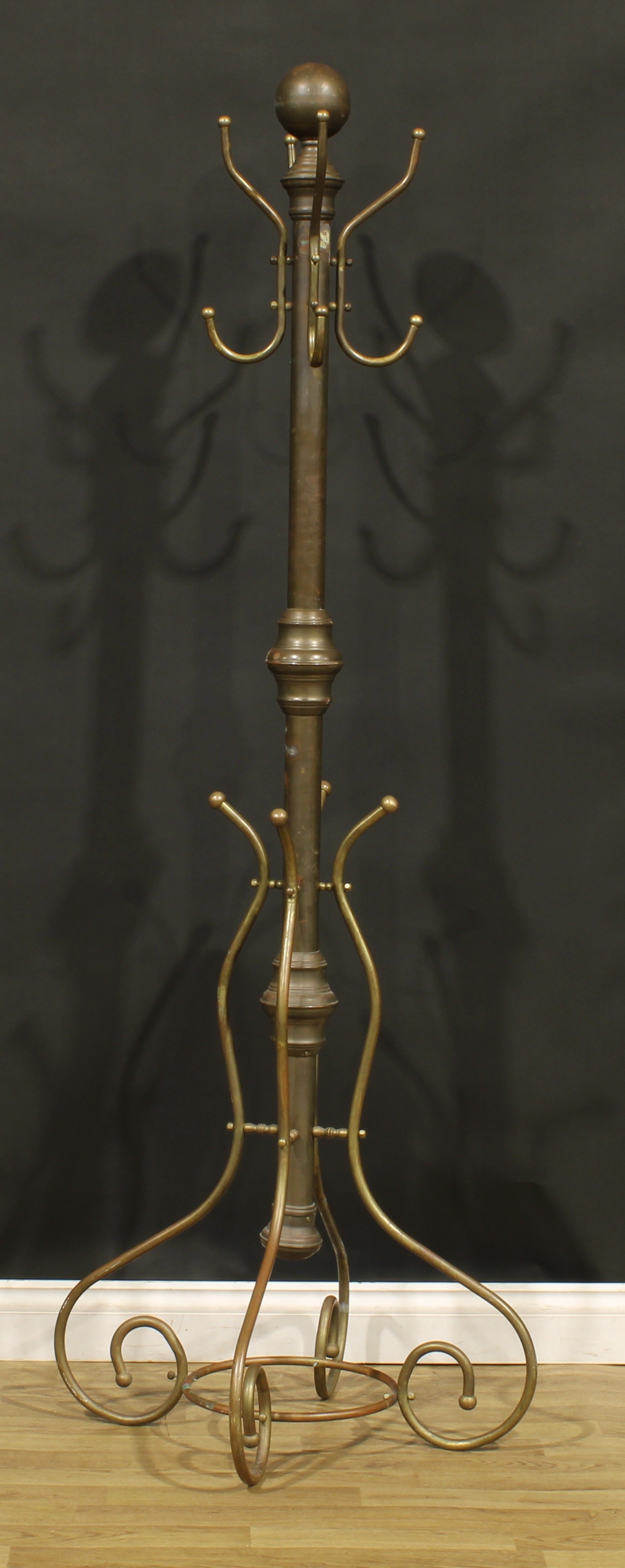 An early 20th century brass coat and hat stand, possibly American, sphere finial above four - Image 3 of 3