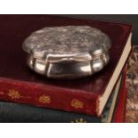 An 18th century silver shaped serpentine snuff box, chased with scenes from Classical antiquity,