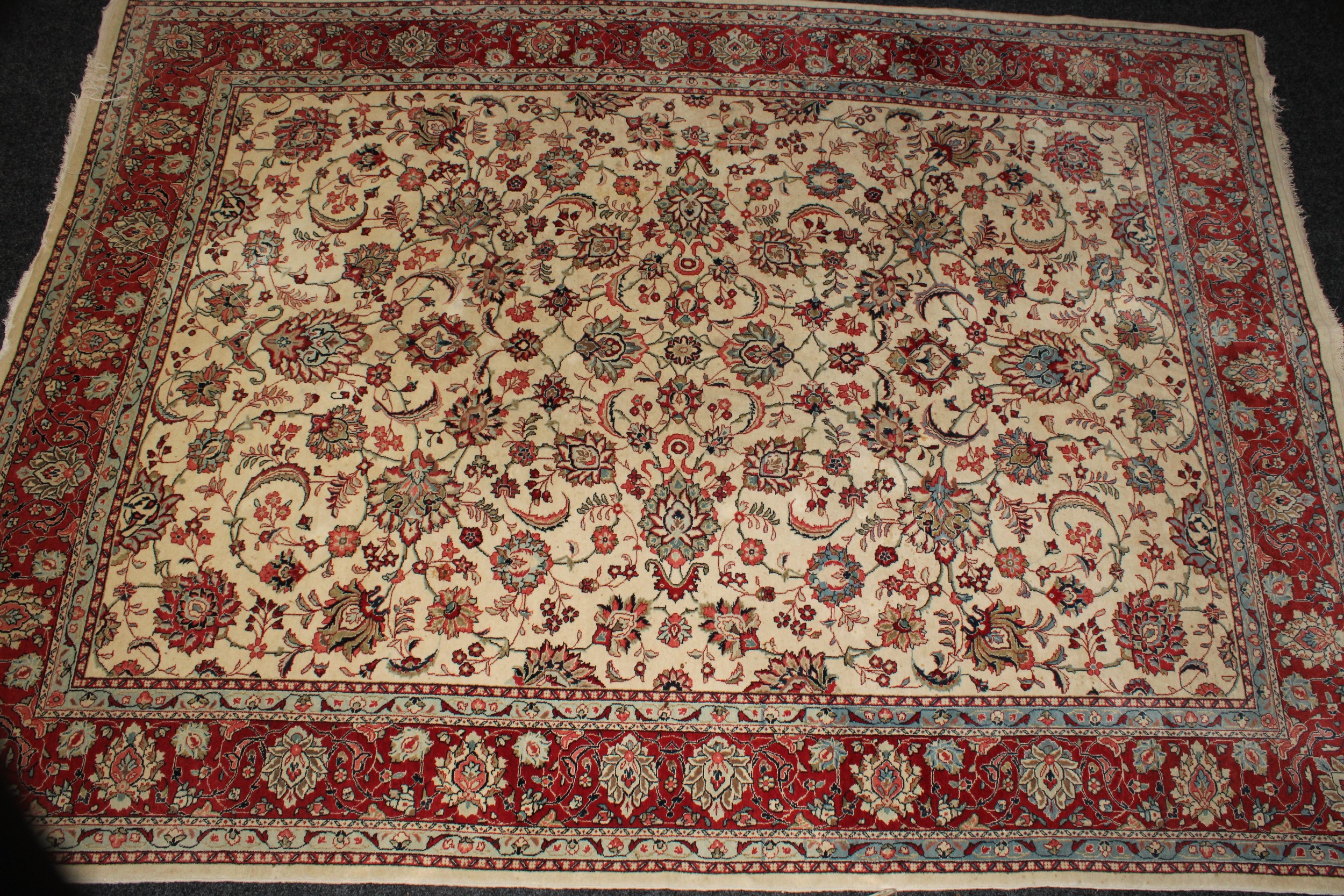 An Iranian Isfahan type wool rug or carpet, 366.5cm x 268cm