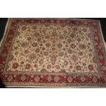 An Iranian Isfahan type wool rug or carpet, 366.5cm x 268cm