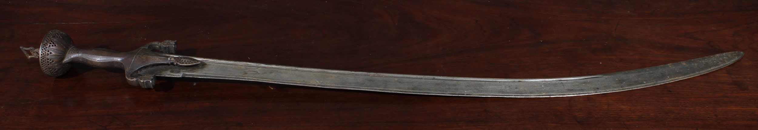 A 19th century Indian talwar, 80cm curved blade with armourer’s marks, steel hilt with lotus - Image 2 of 3