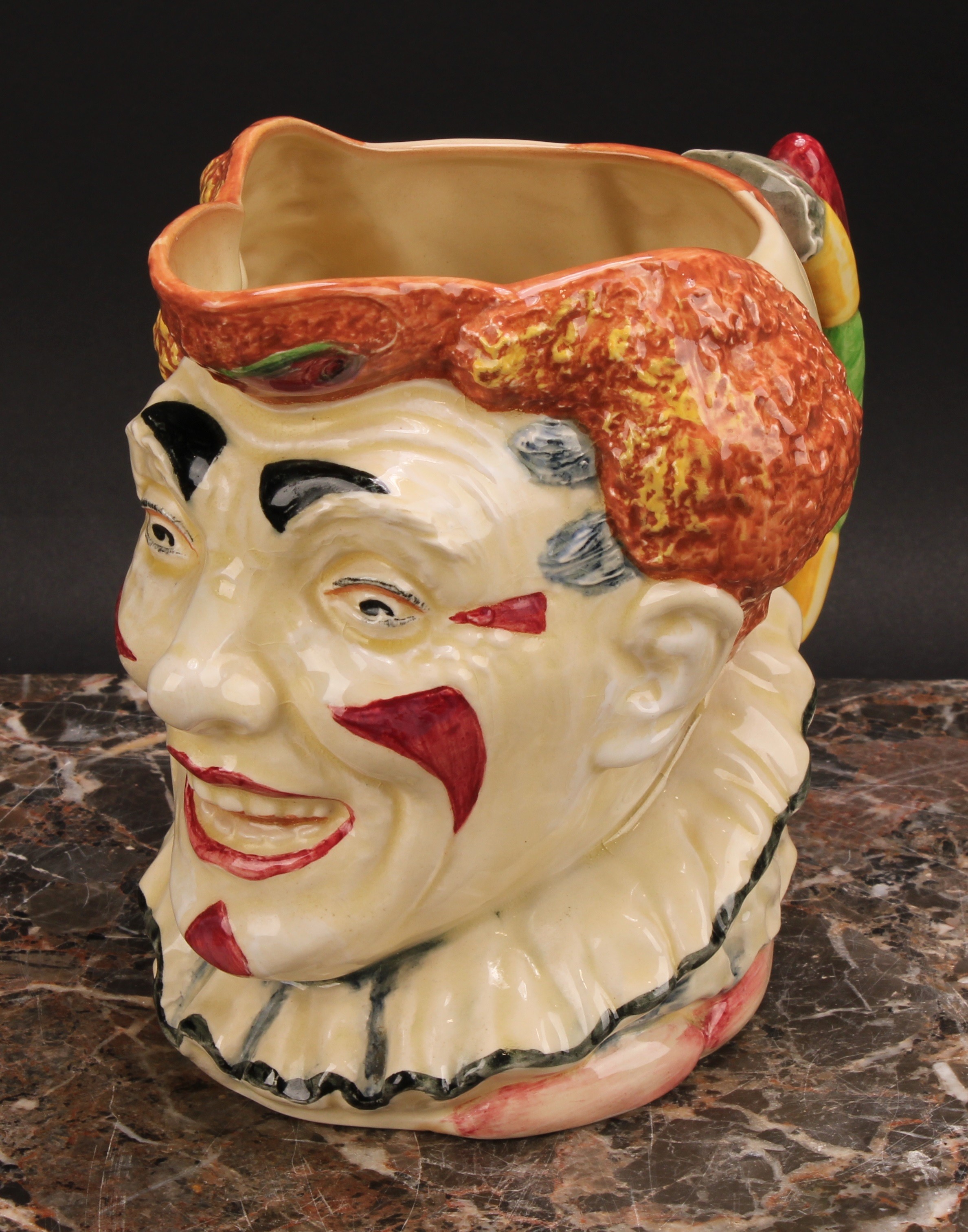A Royal Doulton character jug, The Clown, designed by H. Fenton, decorated in polychrome with red - Bild 3 aus 5