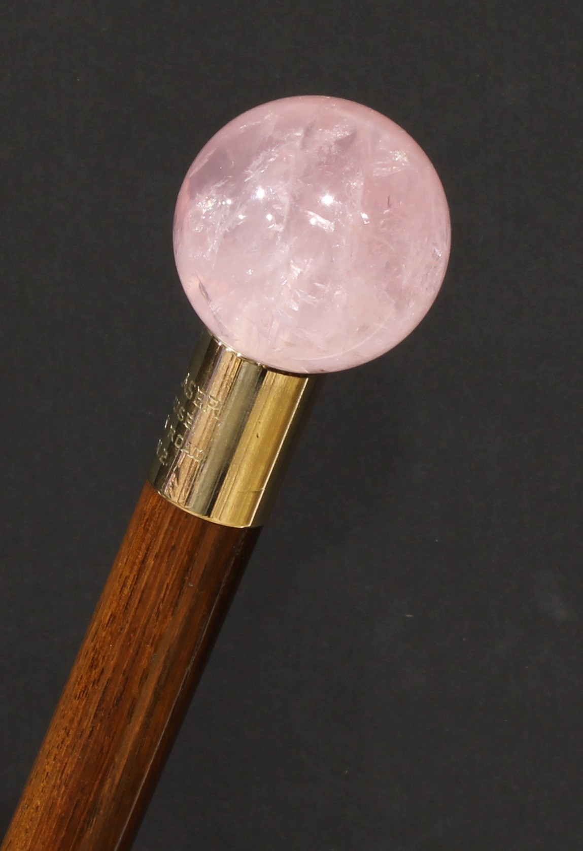 A rose quartz mounted walking stick, globular pommel, the gilt metal pommel inscribed Martin Glaser,